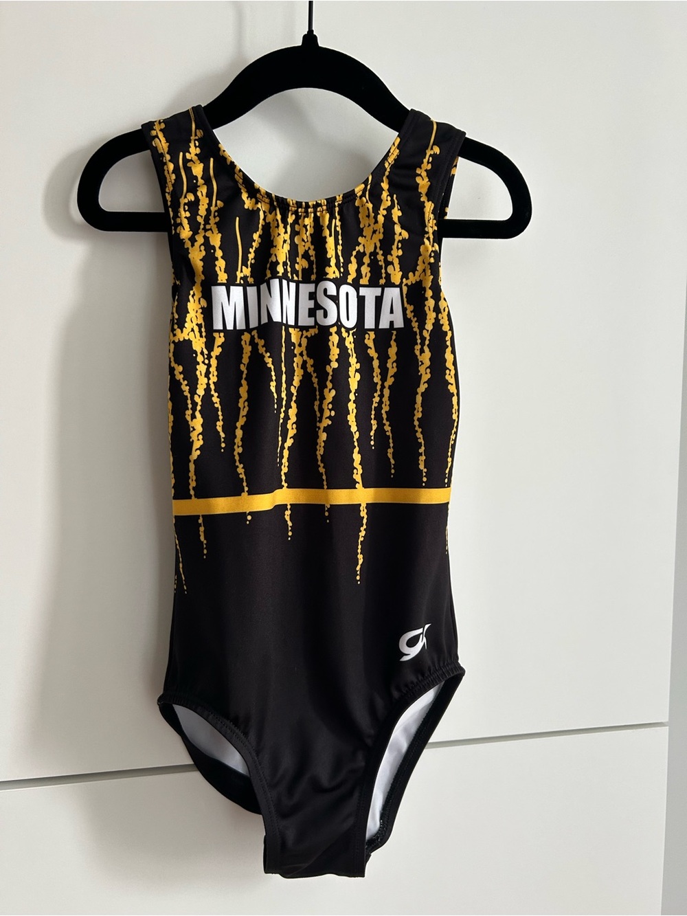 GK Gymnastics Leotard Minnesota Black + Gold - Child’s Medium